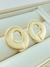 BRINCO OVAL VAZADO ACABAMENTO ACETINADO FOLHADO A OURO