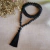 Japa mala 108 cuentas de piedra volcánica negra, borla también negra. Collar de protección.