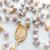 Terço Nossa Senhora Aparecida Lilás Dourado - comprar online