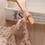 Imagem do Conjunto Short Branco com Blusa Florzinha e Chapéu
