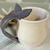 Taza asa delfín