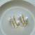 Kit 2 Anéis Para Guardanapos Pérola Duas Voltas 4,5cm x 4,5cm Argola Metal Dourado - comprar online