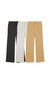 Wide-Leg Pants de tela Waffle en colores blanco, negro y mostaza en formato PNG en fondo blanco.