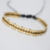 Pulsera en Telar Egipcio con Balines de plata en los bordes hecha a mano