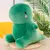 Imagem do Peluche animal recheado macio, brinquedos bonitos do dinossauro, presente macio