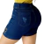 Modelo vestindo shorts femininos de cintura alta, em jeans escuro, com detalhes em dourado e efeito desbotado.