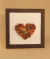 Cuadro corazón. Madera y piedras