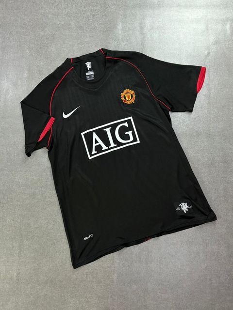 CAMISA MANCHESTER UNITED RETRO AWAY 07/8 PRETO