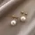 Brincos de Pérola Branca Extragrandes com Zircão e Acabamento Dourado - Elegâ - loja online