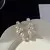 Brincos de Pérola Branca Extragrandes com Zircão e Acabamento Dourado - Elegâ