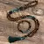 Conjunto Japamala Olhos de Tigre Amarelo e Onix Preto - comprar online