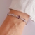 Pulseira Riviera com Gotas Roxas no Ródio Branco