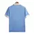 Camisa azul da Seleção Uruguai I 24/25, modelo masculino, com detalhes em branco e escudo bordado.

