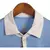 Camisa azul da Seleção Uruguai I 24/25, modelo masculino, com detalhes em branco e escudo bordado.

