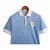 Camisa azul da Seleção Uruguai I 24/25, modelo masculino, com detalhes em branco e escudo bordado.

