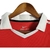 Camisa retrô vermelha do Manchester United, modelo 10/11, da Nike, com detalhes em branco e logo do time