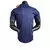 Camisa polo azul do Barcelona 23/24 da Nike para treino masculino, exibida em manequim.

