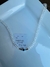 Choker cristales blancos y plata con dije ojito turco.