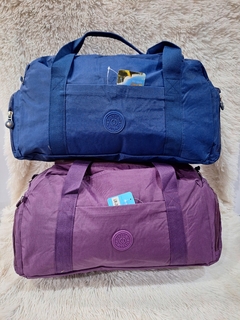 BOLSO "JINYUBO" OVALADO 4 COMPARTIMENTOS en internet
