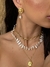 BR91554 - BRINCO CONCHA COM PÉROLAS - FOLHEADO A OURO - comprar online
