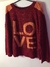 Sweater loving him was red