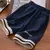 Camiseta e shorts de lapela infantil