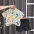 Imagem do Conjunto de camiseta e shorts de algodão de manga curta infantil