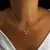 Collar Dije Estrella Rosa | Acero B | Disp en Londres Cta. - comprar online
