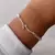 Pulsera Flechas | Acero B | Disp en Londres Cta.