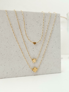 TRIO SÍMBOLOS DOURADO - comprar online