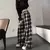 Calça com design de xadrez