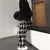 Calça com design de xadrez - loja online