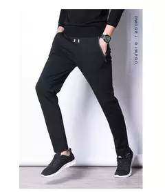Image of MRMT 2024 nuevos pantalones de primavera y otoño para hombre, pantalones de ocio de algodón de Color puro para hombre, pantalones elásticos con cremallera y bolsillo