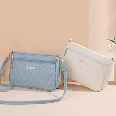 Bolsos de mensajero bordados, bolsos de cuero para mujer, bolsos para mujer, bolso principal de mano con bola de pelo para mujer - Eleganzie
