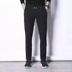 Image of MRMT 2024 nuevos pantalones de primavera y otoño para hombre, pantalones de ocio de algodón de Color puro para hombre, pantalones elásticos con cremallera y bolsillo