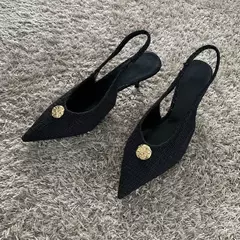Zapatos de tacón alto negros a la moda para mujer, zapatos de tacón sexis con boca poco profunda y puntiaguda, zapatos de oficina con talón descubierto para primavera 2025