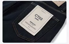 SIMWOOD 2025 Otoño Invierno nuevo ajuste Regular 15oz pantalones vaqueros indecolorables hombres cómodo proceso cepillado forro pantalones vaqueros pesados on internet