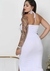 Vestido Feminino Midi Casual Kardashian Tubinho com Fenda na internet