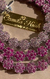 Riviera de flores cravejadas em degrade Pink no banho Ródio Branco na internet