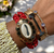 Pulseira Maxi búzios com detalhes de crochê vermelho na correntaria no banho Ouro