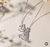 Conjunto Nossa Senhora Aparecida com gota Cristal no banho Ródio Branco