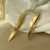 Brinco Dois Triangulos de Chapa - comprar online