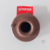 Flange para caixa d'água soldável na cor marrom, vista superior, com logotipo da Krona ao fundo.