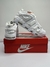 Nike Uptempo Low Triple White en internet