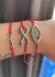 Pulsera hilo rojo con dije cruz plateada - comprar online