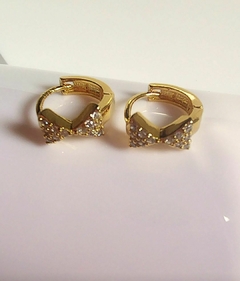 Argolinha com laço cravejado, banhadas a ouro 18k/ semijoias - comprar online