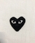 Polo CDG Hearts na internet