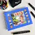 Kit Livro Bobbie Goods De Colorir Capa Dura + 36 ou 100 Canetinhas