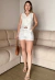 CONJUNTO SHORT E COLETE GISELE BRANCO - comprar online