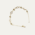 Pulseira de pérolas com bolinhas banhada em ouro 18K, apresentando um design elegante e delicado.